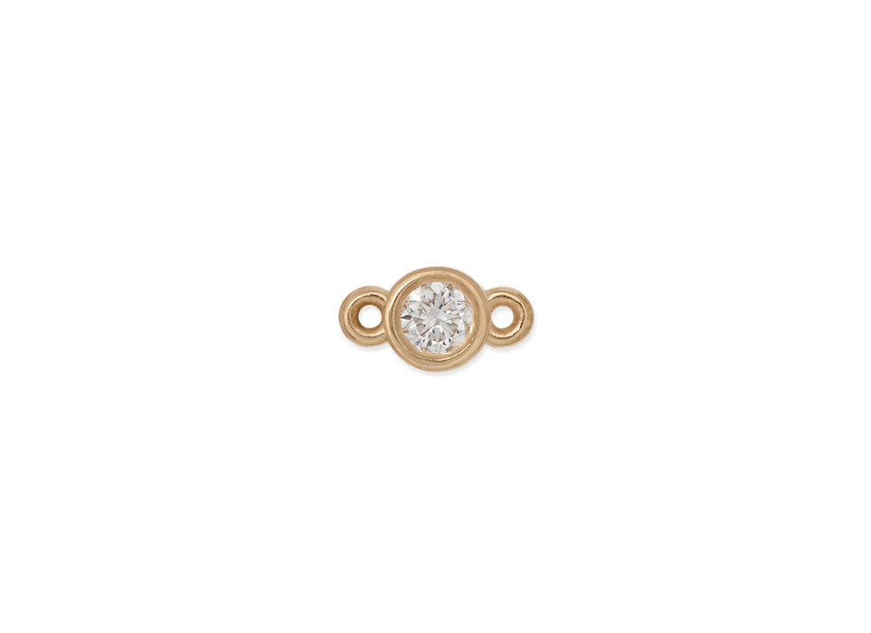 A bezel-set 2mm diamond connector in 14K gold with two bales on each end.