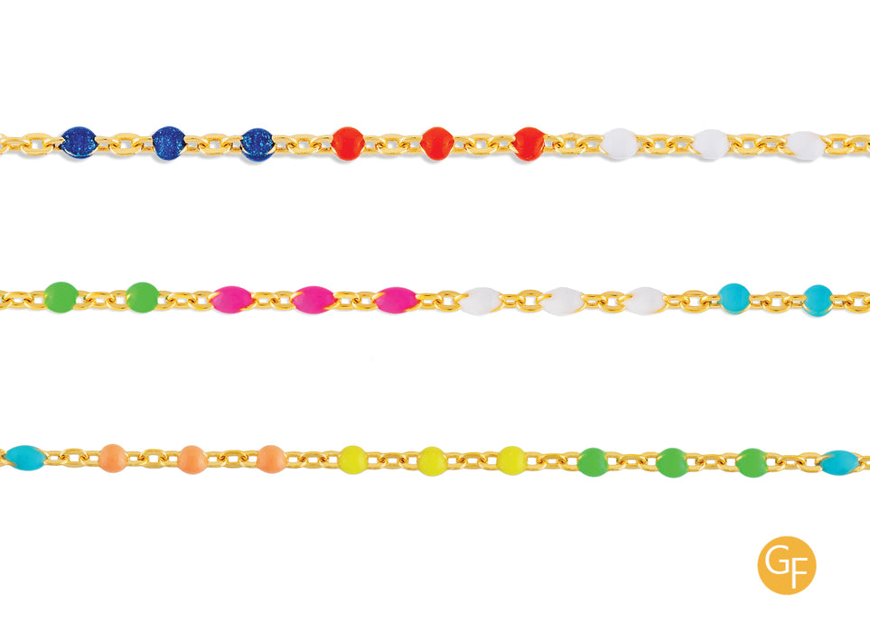A collection of three multicolor enamel cable chains with gold fill, each featuring different combinations of orange, yellow, green, blue, white, and red enamel beads.