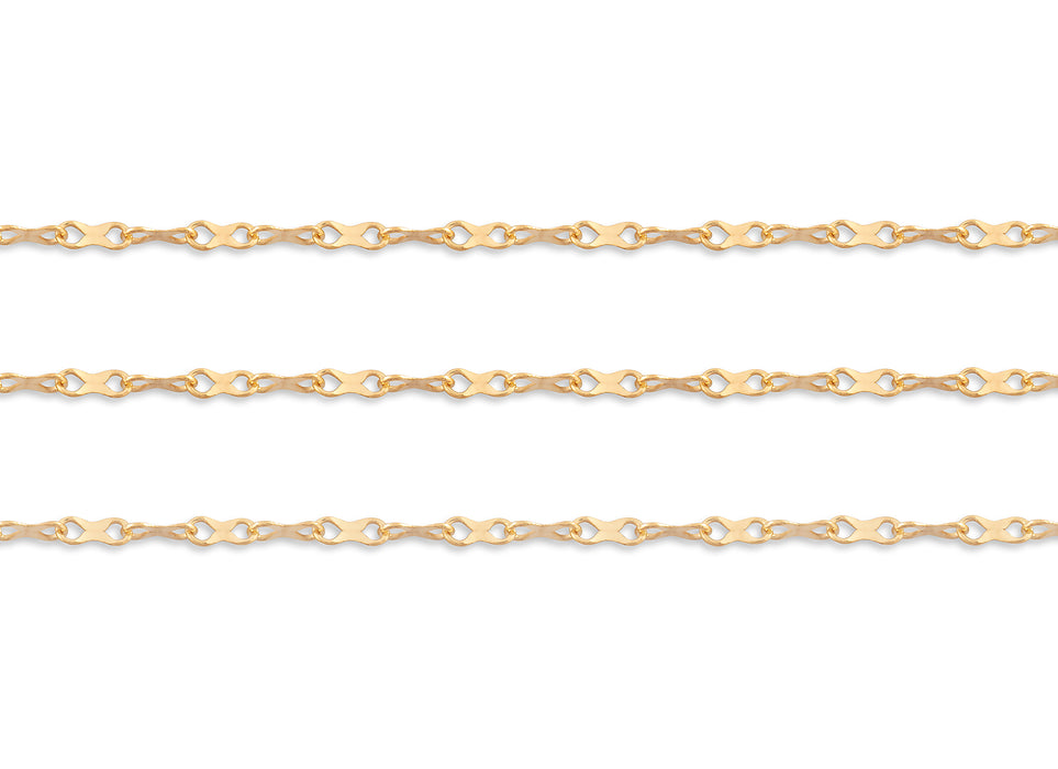Gold hammered chain on a white background