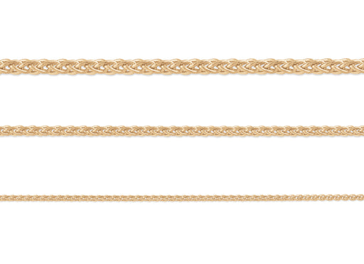 A set of three 14K yellow gold wheat chains with different thicknesses, displayed horizontally.