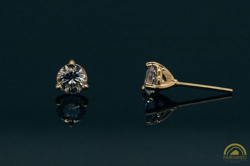 Photo of pair of 5mm Round 3-Prong Fairmined Gold Stud Earring Mountings from RIVA Precision