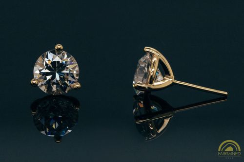 Photo of pair of 7.5mm Round 3-Prong Fairmined Gold Stud Earring Mountings from RIVA Precision