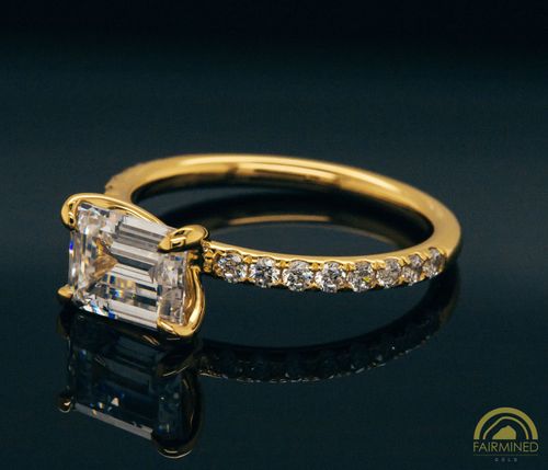 Alternate view of East-West Emerald Cut Diamond Pavé Engagement Ring Semi-Mount in Fairmined Yellow Gold from RIVA Precision