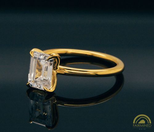Alternate view of Emerald Cut Diamond Solitaire Engagement Ring Mounting in Fairmined Yellow Gold from RIVA Precision