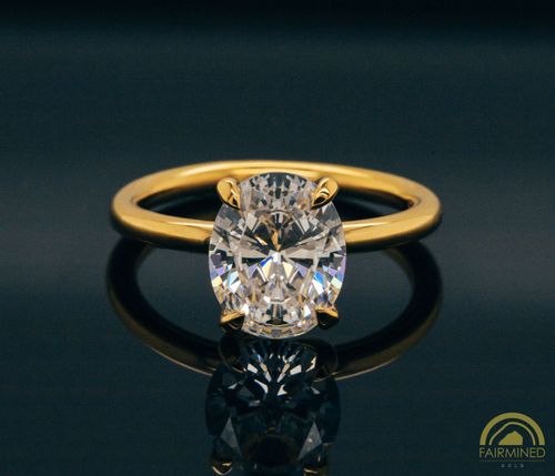 Photo of Oval Diamond Solitaire Engagement Ring Mounting in Fairmined Yellow Gold from RIVA Precision