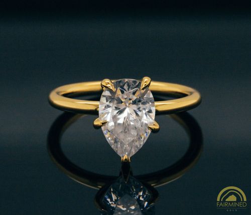 Photo of Pear-Shaped Diamond Solitaire Engagement Ring Mounting in Fairmined Yellow Gold from RIVA Precision