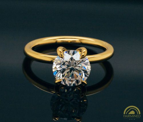 Photo of Round Diamond Solitaire Engagement Ring Mounting in Fairmined Yellow Gold from RIVA Precision