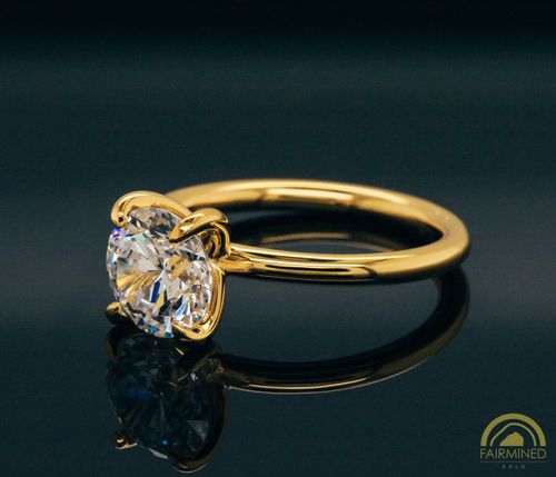 Alternate (side) view of Round Diamond Solitaire Engagement Ring Mounting in Fairmined Yellow Gold from RIVA Precision