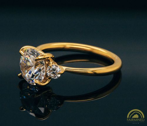 Alternate view of Round Diamond Three-Stone Engagement Ring Semi-Mount in Fairmined Yellow Gold from RIVA Precision