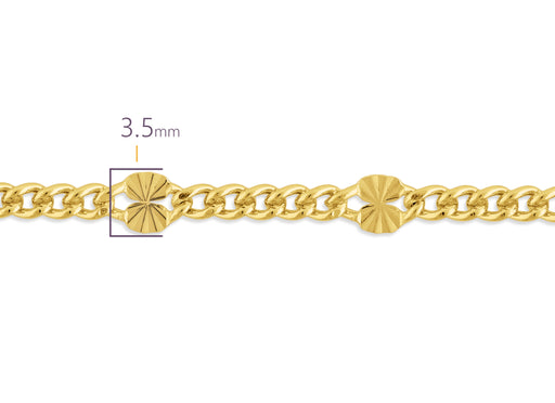 Gold chain with a close-up of its thickness on a white background