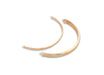 Gold hoop earrings on a white background