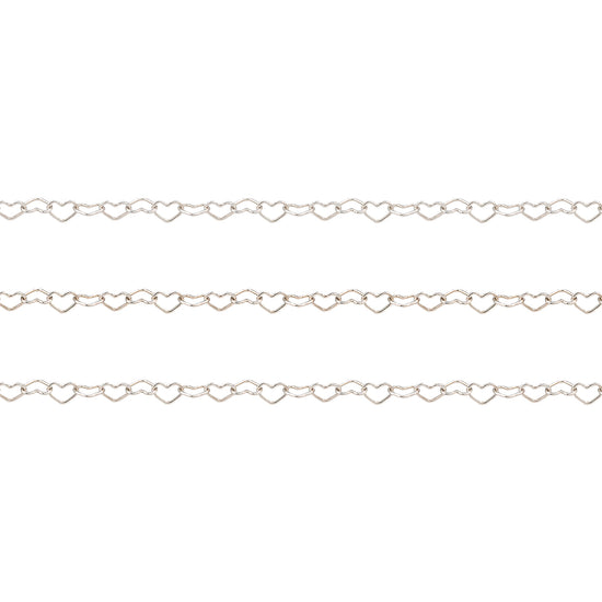 Silver chain with heart-shaped links on a white background