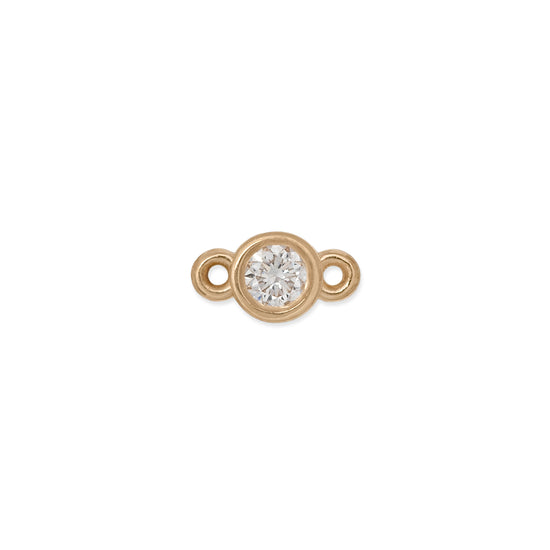 A bezel-set 2mm diamond connector in 14K gold with two bales on each end.