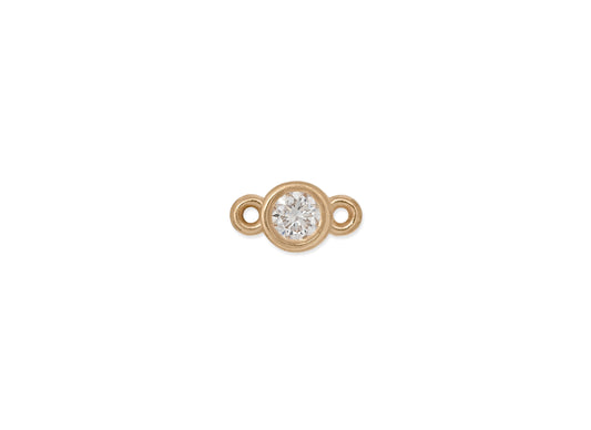 A bezel-set 2mm diamond connector in 14K gold with two bales on each end.