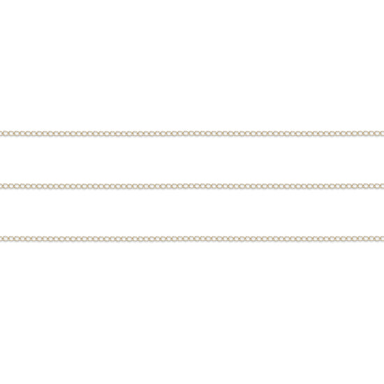 Thin sterling silver curb chain on a white background