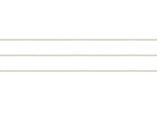 Thin sterling silver curb chain on a white background