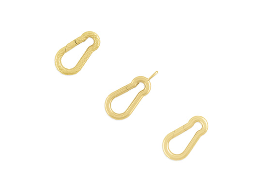 Three carabiner-shaped invisible clasps made of gold, displayed against a white background.