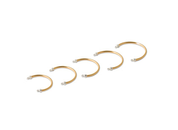 Set of permanent Cuff Rings with small pearls on a white background
