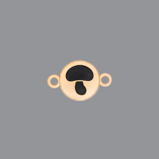 Round emoji connector in gold with a mushroom engraving on gray background