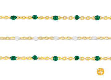 Three enamel cable chains with gold-colored links and green enamel accents, displayed against a white background.