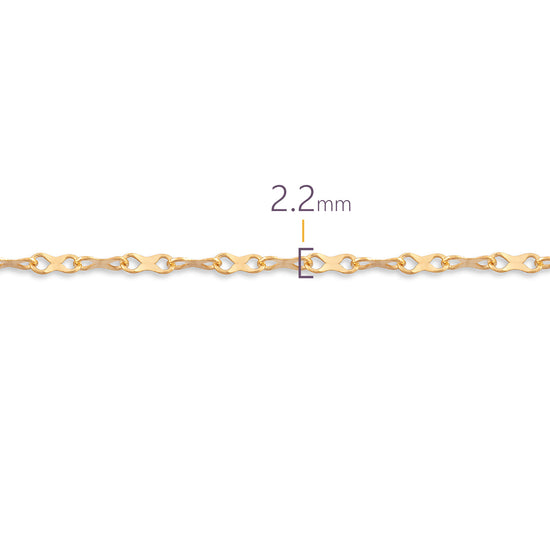 Gold hammered chain with a thickness measurement of 2.2 mm on a white background