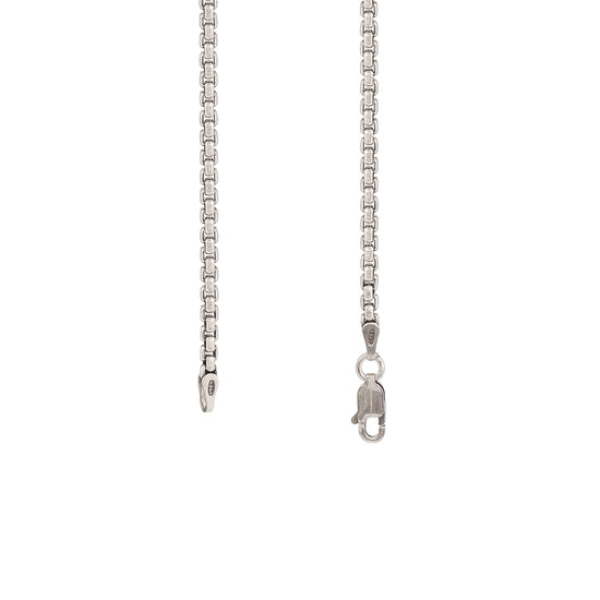 Silver chain necklace on a white background