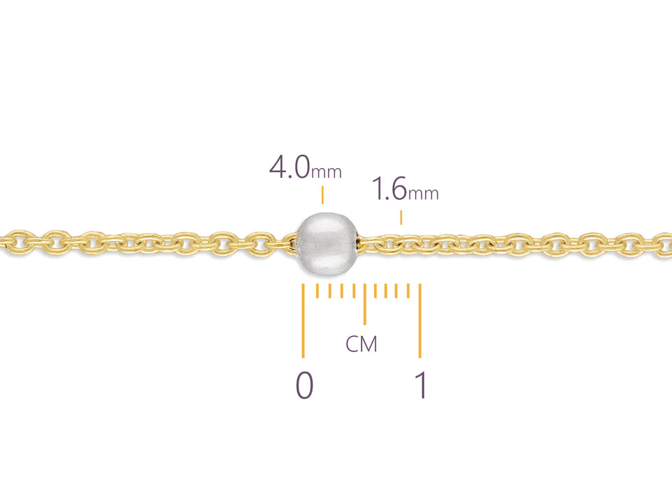 Gold chain with a pearl and measurement scale on a white background
