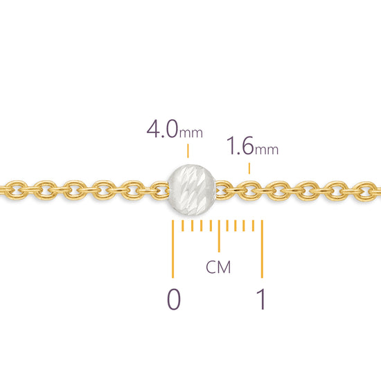 Gold chain with a measurement scale showing its thickness and length.