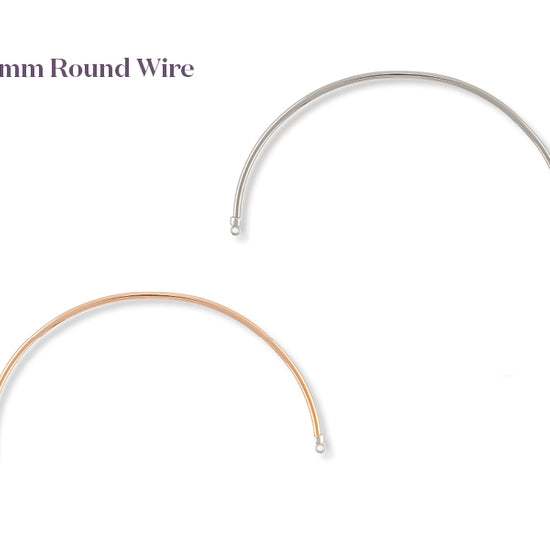 Two curved pieces of round wire on a white background with text indicating the diameter.