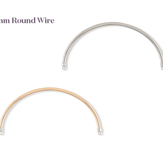 Two curved pieces of round permanent half cuffs, one silver and one gold, on a white background.