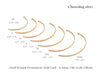 Gold hoop earrings with size chart on a white background