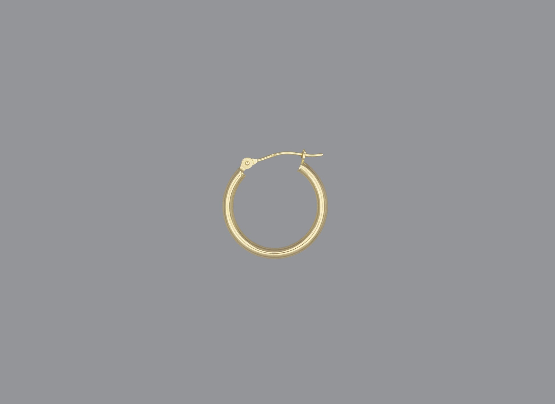 A hoop earring made of 14KY gold, displayed against a grey background.