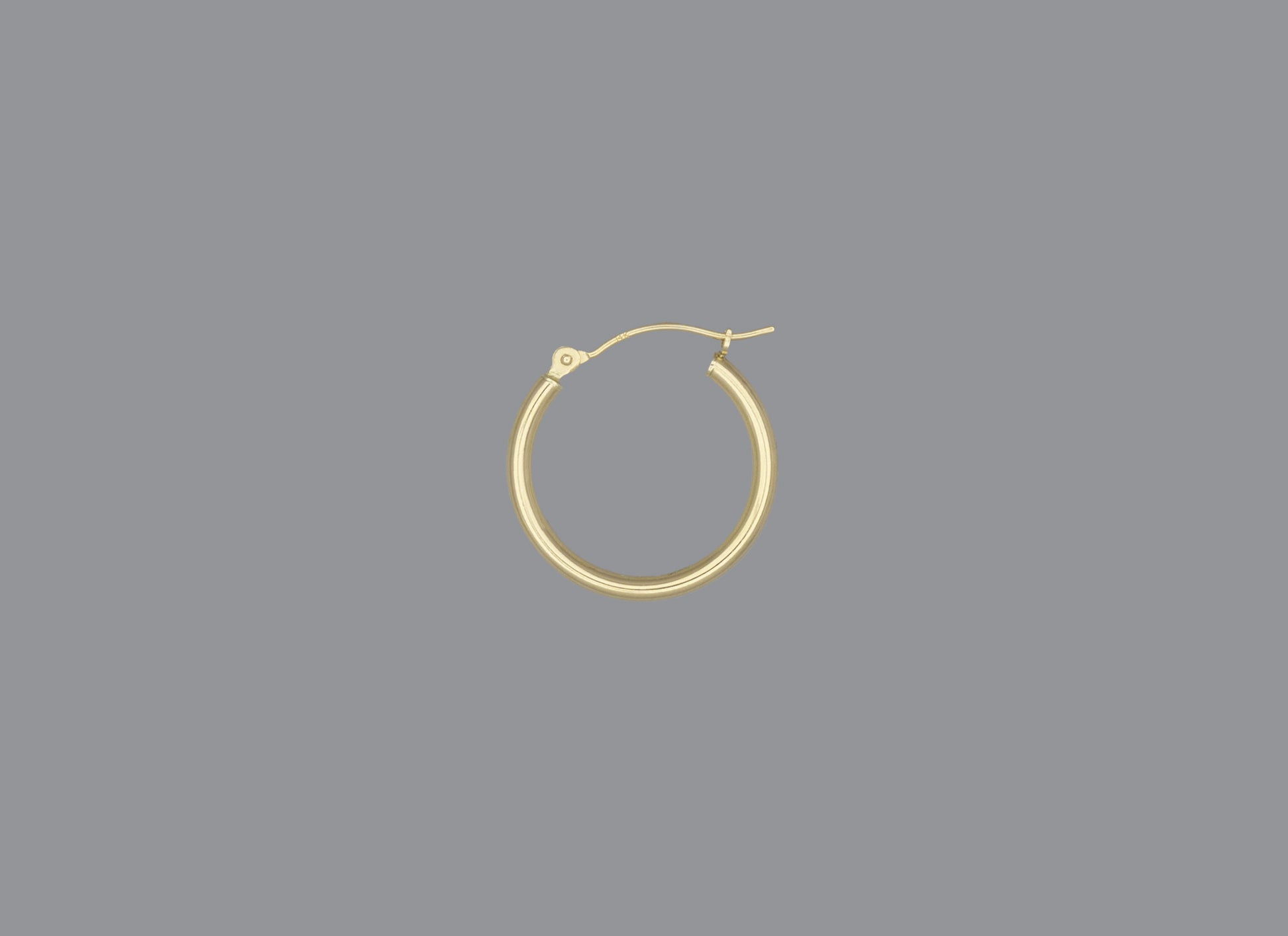 A hoop earring made of 14KY gold, displayed against a grey background.