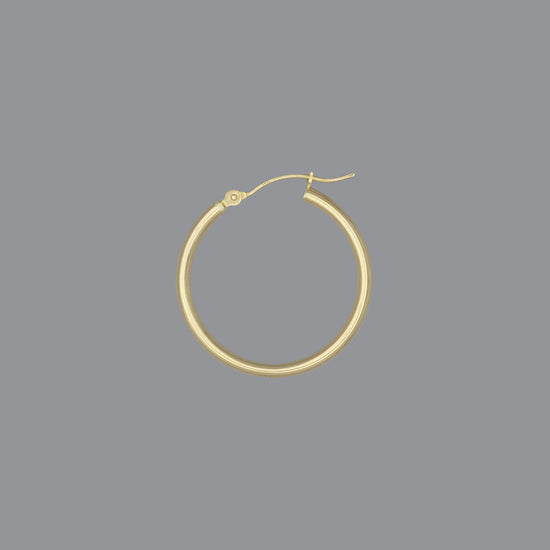 A hoop earring made of 14KY gold, displayed against a grey background.
