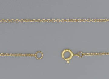 A close-up image of a gold cable chain necklace with a focus on the extra-small circular links and the clasp.