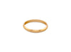 Gold ring on a white background