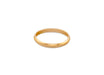 Gold ring on a white background
