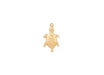 Gold turtle pendant on a white background