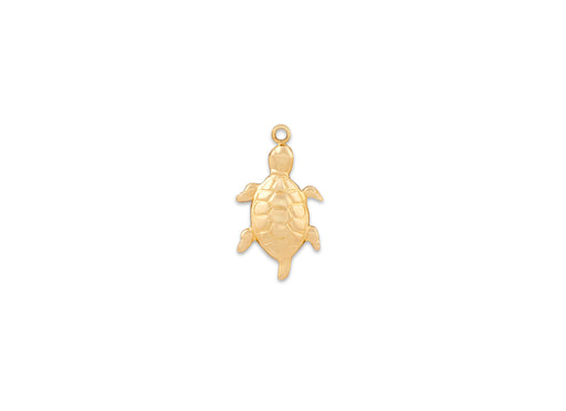 Gold turtle pendant on a white background