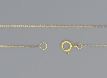 A 0.9mm cable chain necklace with a spring ring clasp and jump rings, displayed on a grey background.