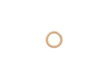 Gold round invisible clasp on a white background