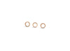 Three wooden rings of different sizes on a white background