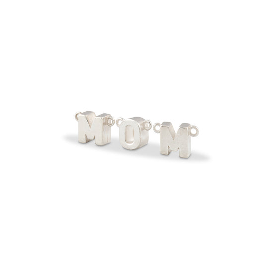 Silver 'MOM' earrings on a white background