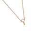 Delicate gold necklace on a white background