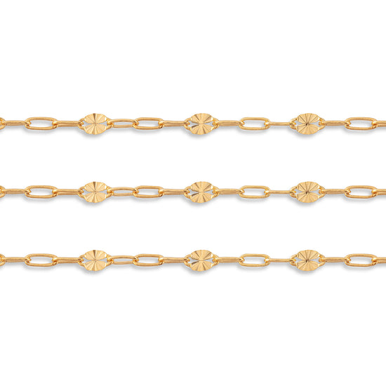 Gold chain with floral links on a white background
