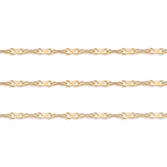 Gold hammered chain on a white background