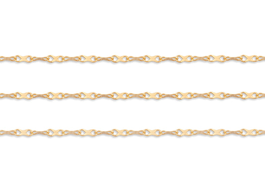 Gold hammered chain on a white background