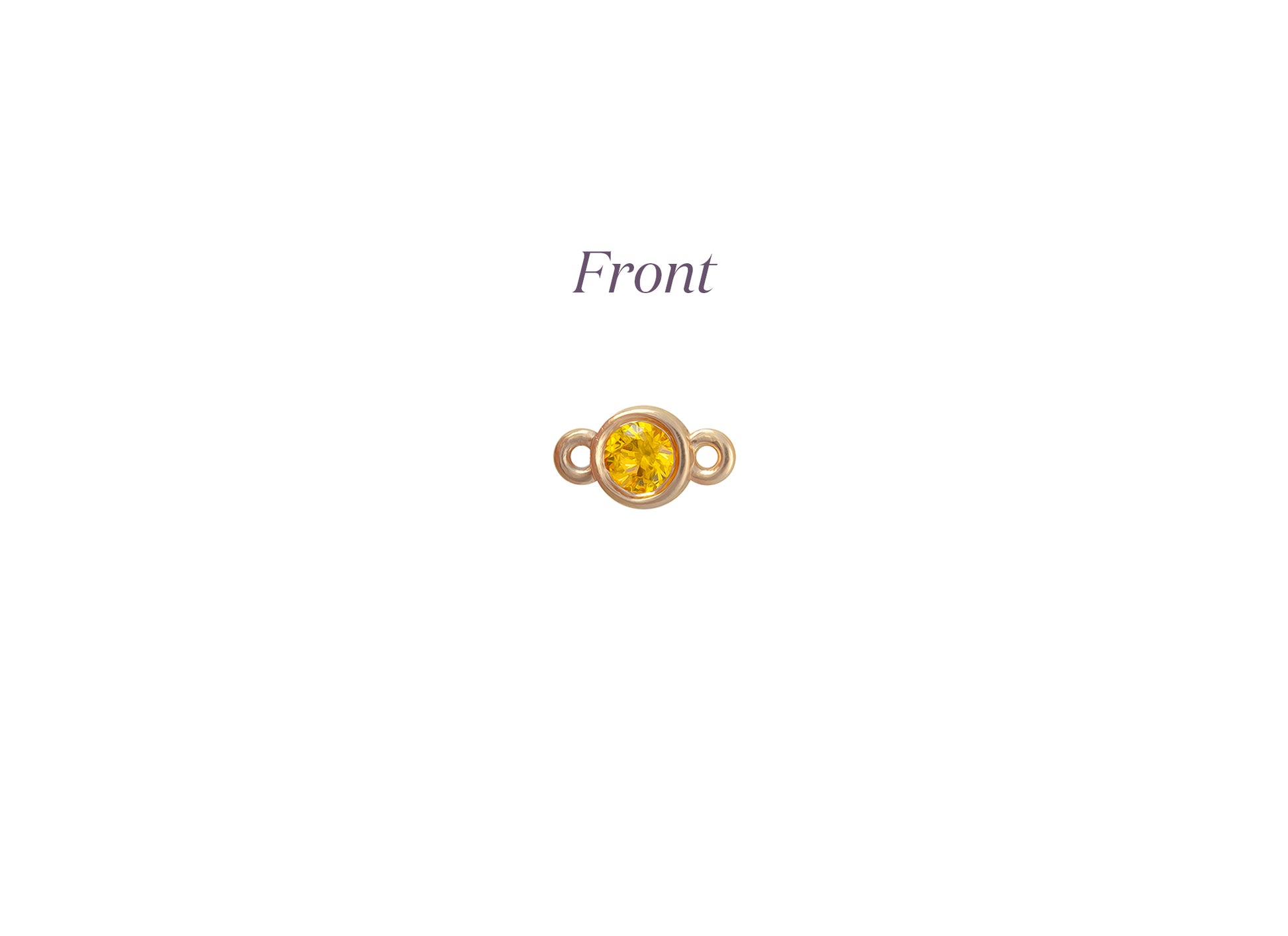 Gold connector with a yellow gemstone on a white background