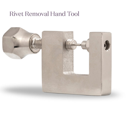 Metal rivet removal hand tool on a white background