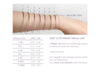 Bangle size chart with wrist measurement guide and bangles on a arm